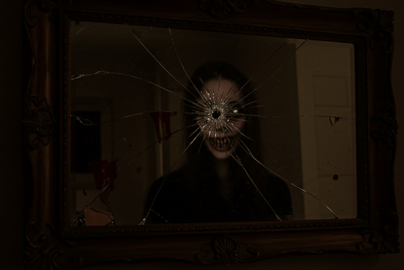 Haunted Mirror Horror Background: A Designer's Gothic Asset